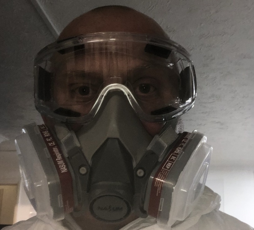 fogging cleaner in full ppe